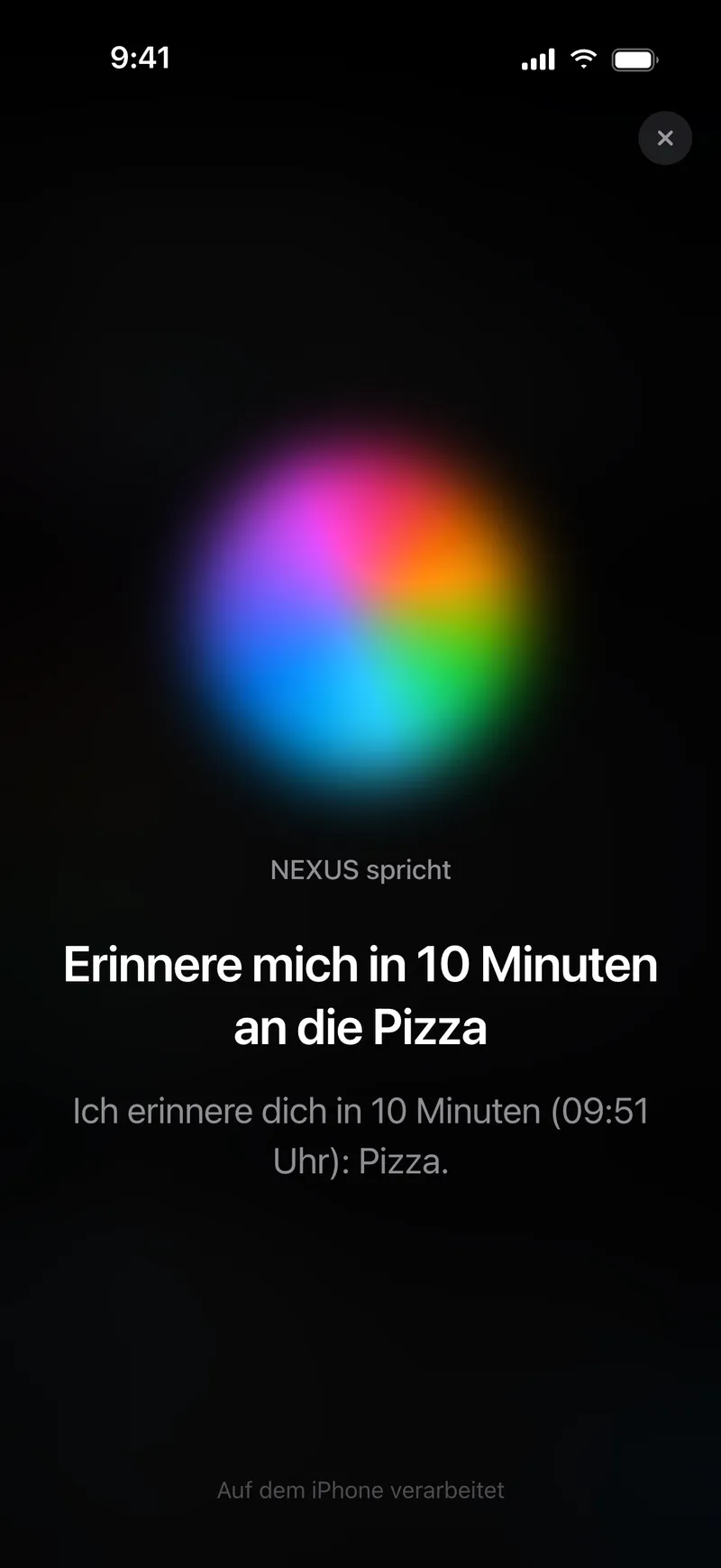 Sprachmodus von NEXUS: „Erinnere mich in 10 Minuten an die Pizza“, darunter die gesprochene Antwort.